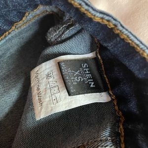 raw hem spliced skinny denim shorts